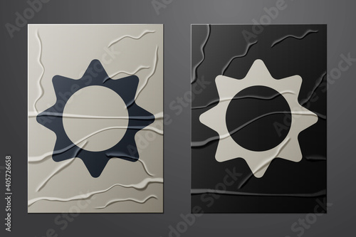 White Sun icon isolated on crumpled paper background. Summer symbol. Good sunny day. Paper art style. Vector Illustration.