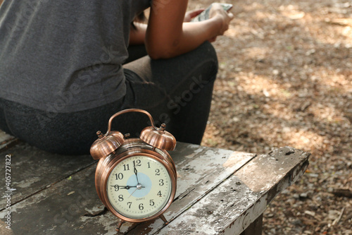 clock of waiting, a woman is waiting someting photo