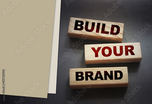 Build yor brand words on wooden blocks Marketing concept photo