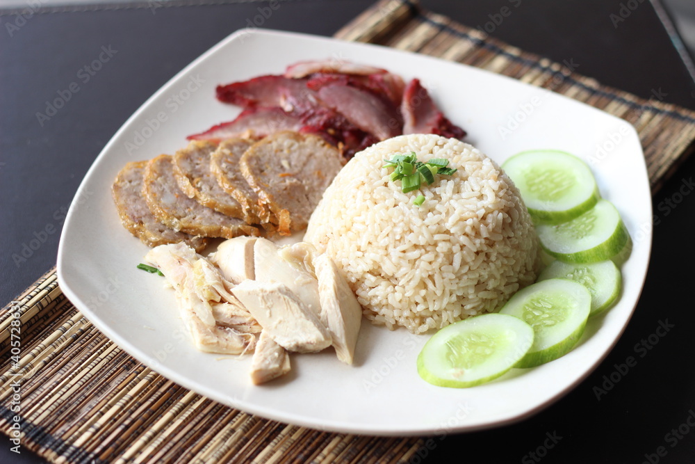 hainamese chichen rice with chicken, beef, and pork meat slices
