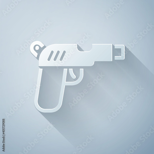 Paper cut Pistol or gun icon isolated on grey background. Police or military handgun. Small firearm. Paper art style. Vector.