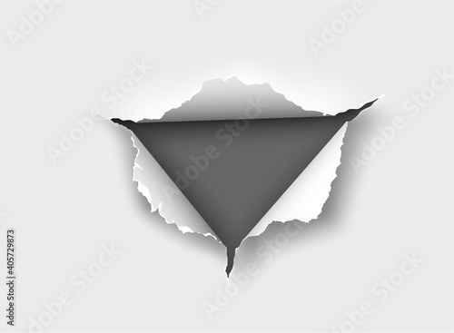 ragged Hole torn in ripped paper on background