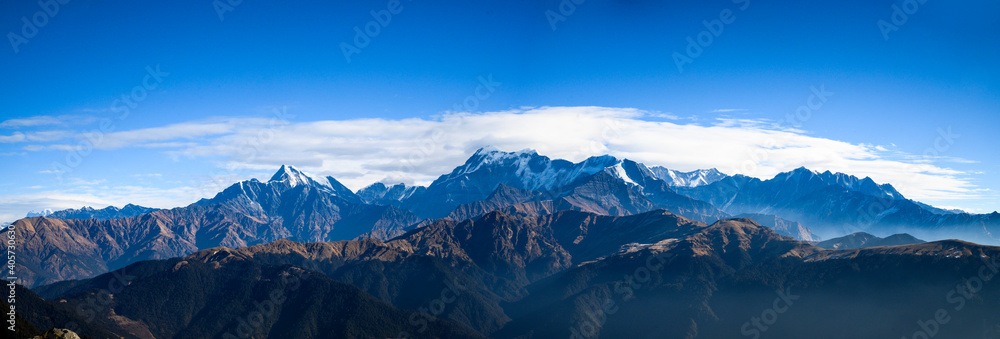 panorama of the mountains. Snow mountain peaks. Panoramic view of Himalaya mountain. 