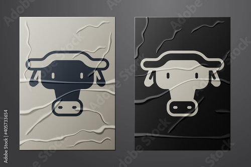 White African buffalo head icon isolated on crumpled paper background. Mascot, african savanna animal. Wild ox, carabao or bison bull with fused horns. Paper art style. Vector.