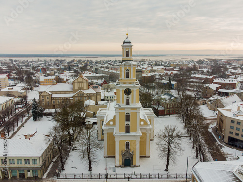 Liepaja city covered by snow Aerial photo.  Saints trinity (holy trinity) church in Liepaja. Snowy day in Liepaja. Aerial photo of Liepaja photo