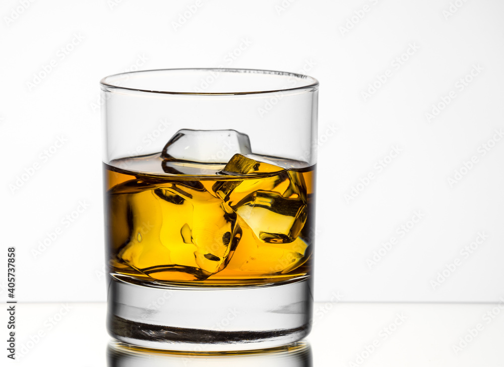 Whisky on the rocks on white background Whisky on the rocks on white background