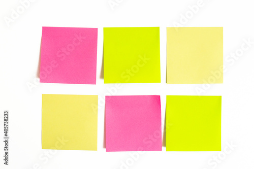 paper sticky note assorted colors on white background. photo