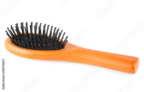 Wooden hairbrush isolated on a white background. Wooden comb.