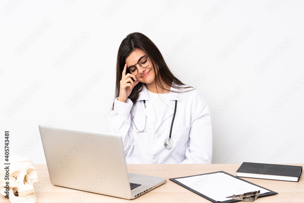 Professional traumatologist in workplace laughing Professional traumatologist in workplace laughing