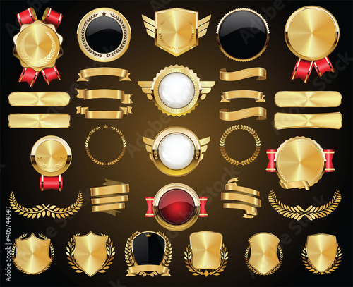 Collection of Golden badges labels laurels shield and metal plates 