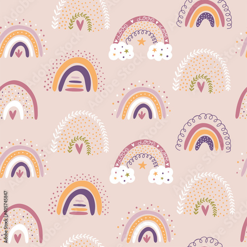 Seamless pattern with rainbows. Spring scrapbook. Vector seamless background.