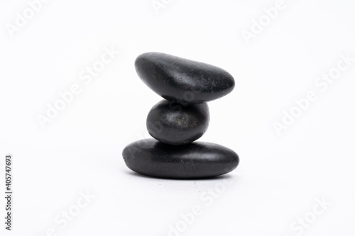 Zen concept  stones arranged against white background