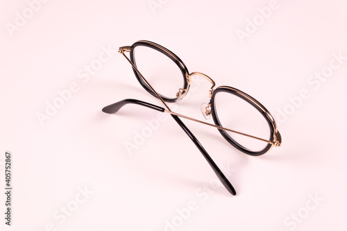 glasses lie diagonally and temples removed