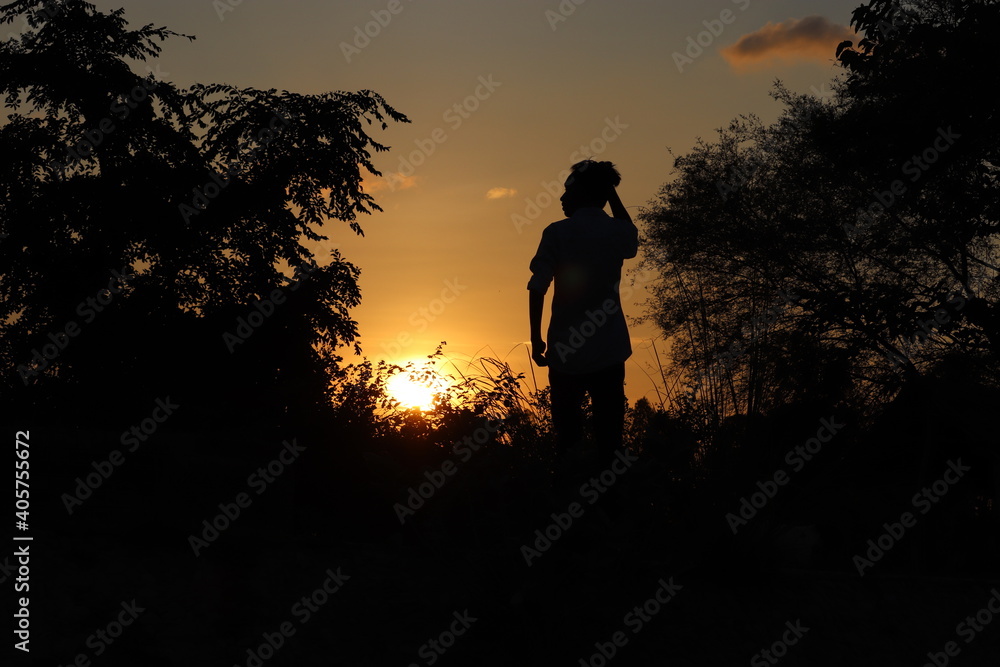 silhouette of a person,sunset
