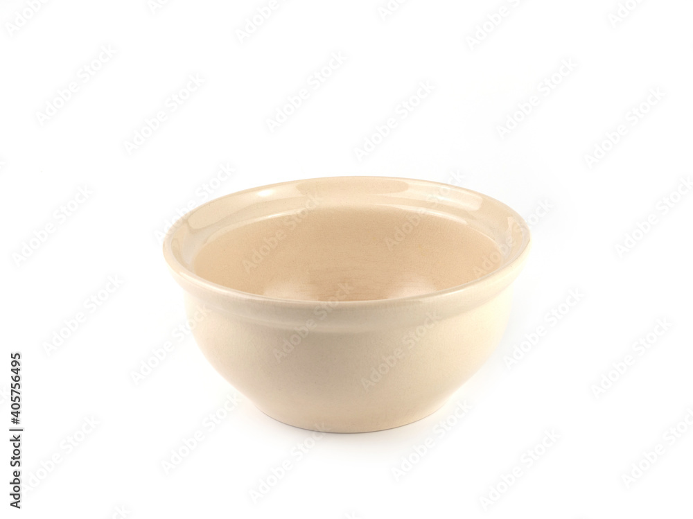 Beige ceramic bowl isolated on a white background. Use for home or restaurant, food design. Kitchen accessory.. Beige ceramic bowl isolated on a white background. Use for home or restaurant, food design. Kitchen accessory..