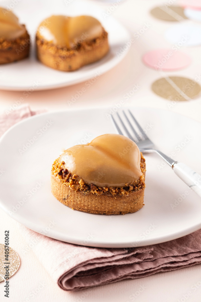 Heart shape vanilla tart with nuts. Valentine's Day. Heart shape vanilla tart with nuts. Valentine's Day.