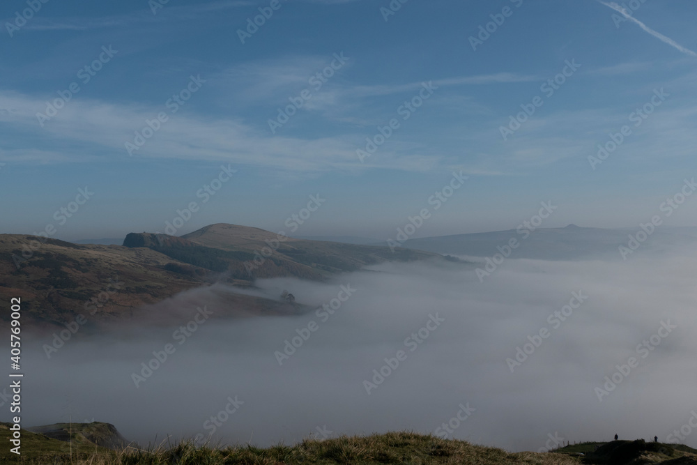 Hills of the Peak District with low clouds and mist