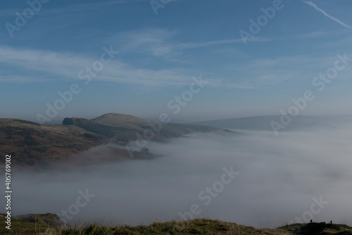 Hills of the Peak District with low clouds and mist