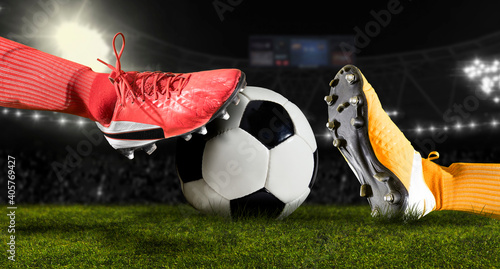 Fotografi Soccer player making sliding tackle