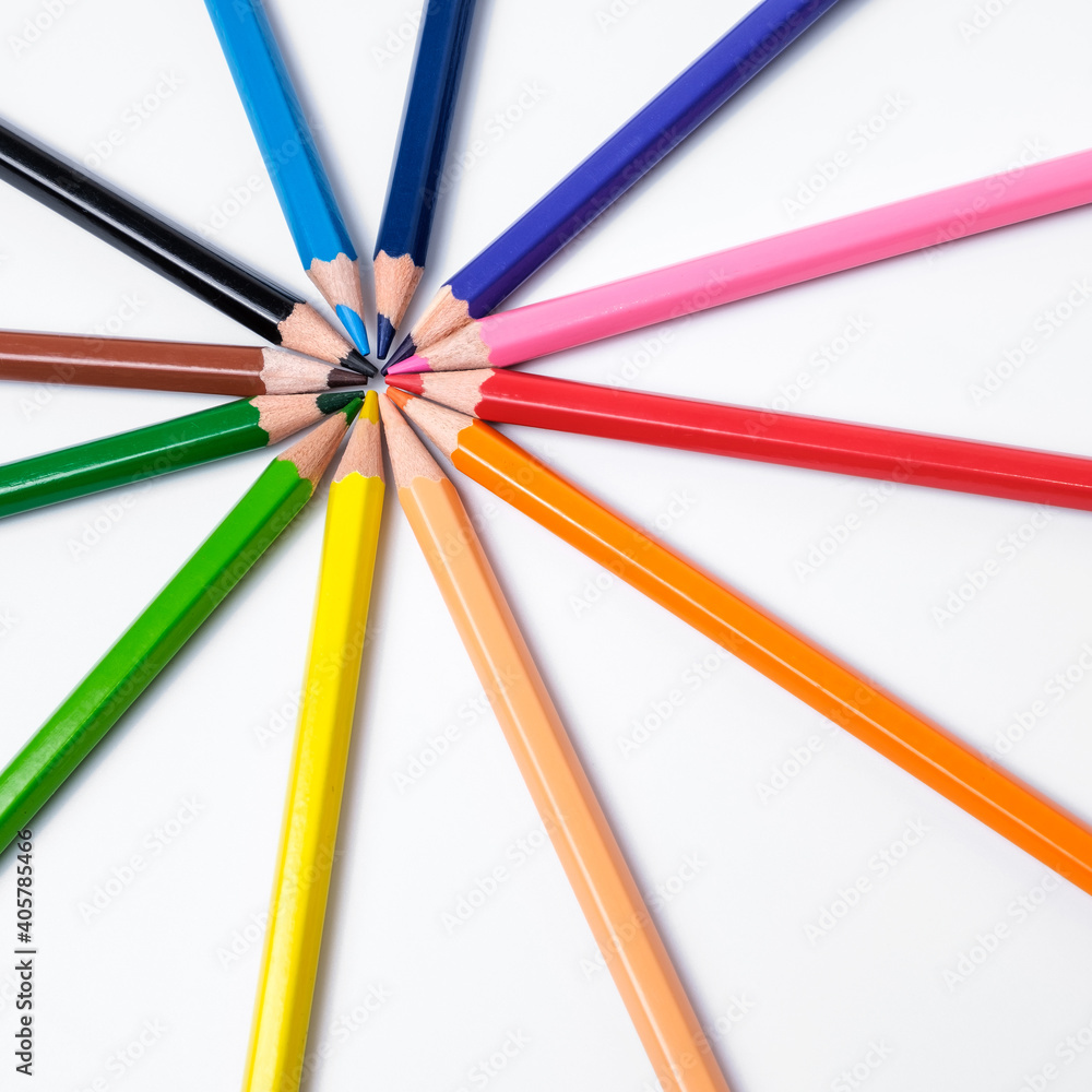 Multi-colored pencils on white background, palette of colors Multi-colored pencils on white background, palette of colors