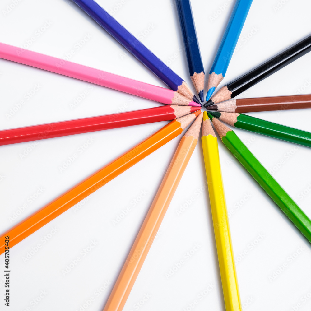 Multi-colored pencils on white background, palette of colors Multi-colored pencils on white background, palette of colors
