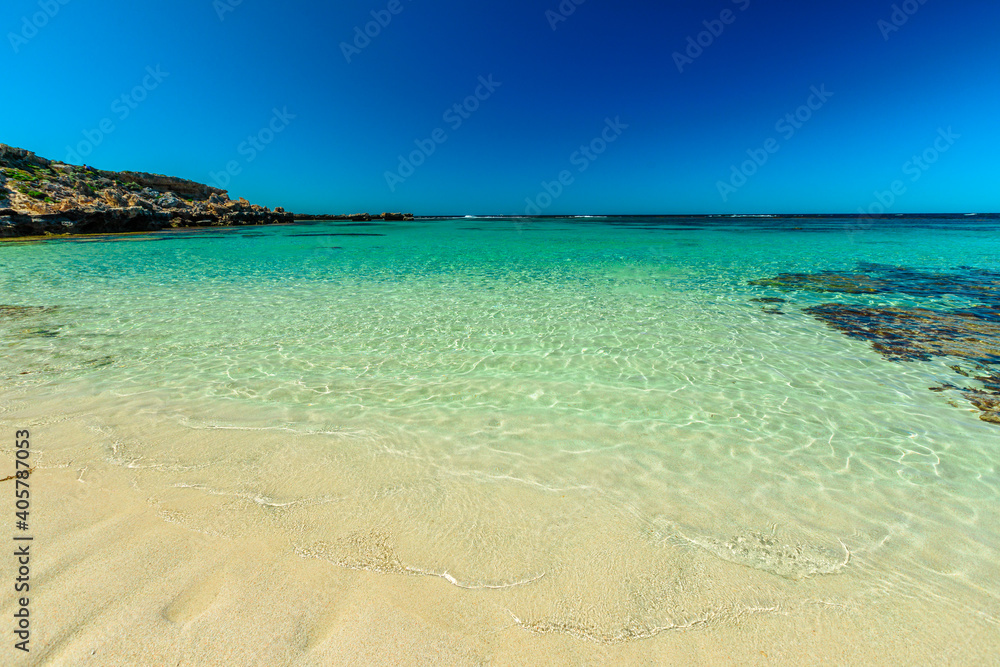 Little Salmon Bay at Rottnest Island, Western Australia. White tropical beach with turquoise crystal clear sea. Salmon Bay, a paradise for snorkeling, swimming and sunbathing. Tourism in Perth.