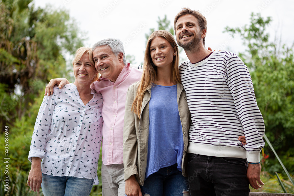 Happy family standing together Happy family standing together