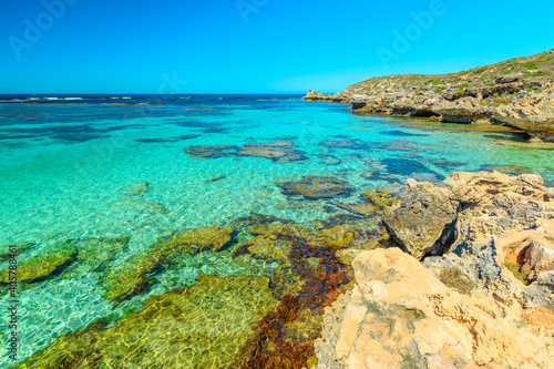 Rottnest Island, Western Australia. Panorama view from cliffs over tropical reef of Little Salmon Bay, a paradise for snorkeling, swimming and sunbathing. Tourism in Perth. Turquoise crystal clear sea