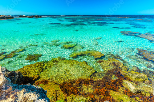 Rottnest Island, Western Australia. Scenic view from cliffs over tropical reef of Little Salmon Bay, a paradise for snorkeling, swimming and sunbathing. Tourism in Perth. Turquoise crystal clear sea. © bennymarty