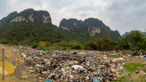 Illigal garbage dump at edge of national park in vietnam