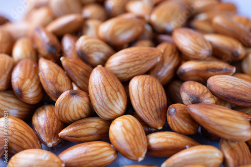 Closeup of soaked almond nuts healthy food