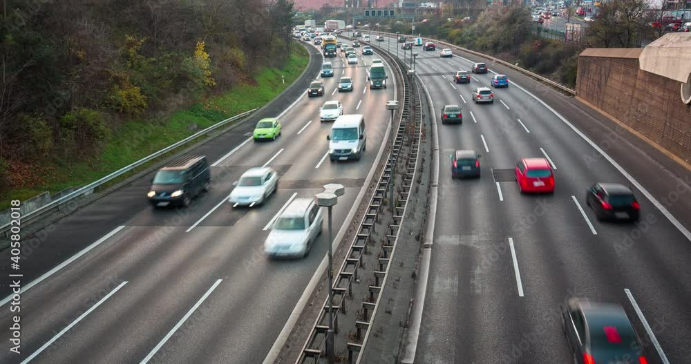 Timelapse of highway traffic during rush hour, motorway, cars Timelapse of highway traffic during rush hour, motorway, cars