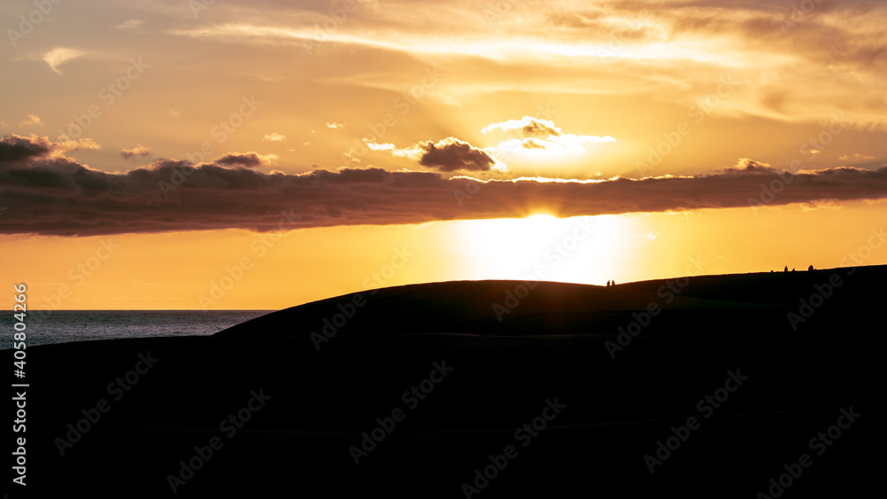 Sunset on Maspalomas dunes in Gran Canaria