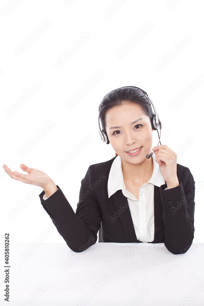 Portrait of Female office worker wearing headset Portrait of Female office worker wearing headset