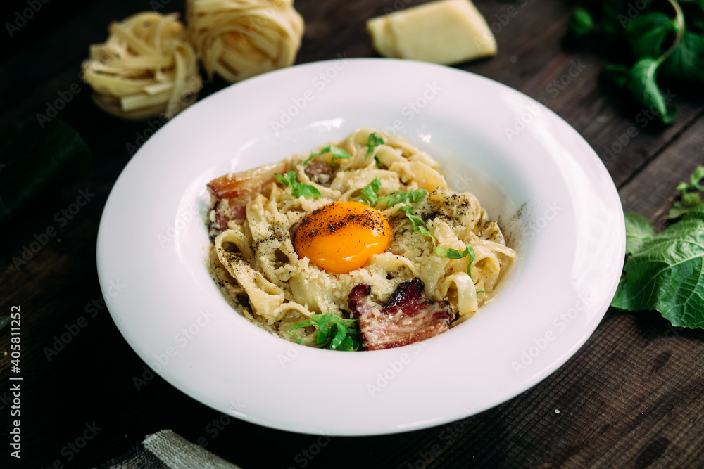 Carbonara paste on a white plate Carbonara paste on a white plate
