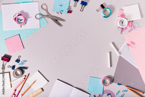 School girlish writing accessories and other stationery form a circle