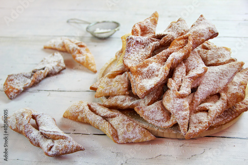 Faworki (angel wings) sprinkled with powdered sugar - traditional Polish carnival delicacy
