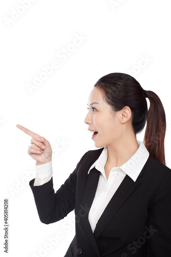 The standing businesswoman with her pointing finger