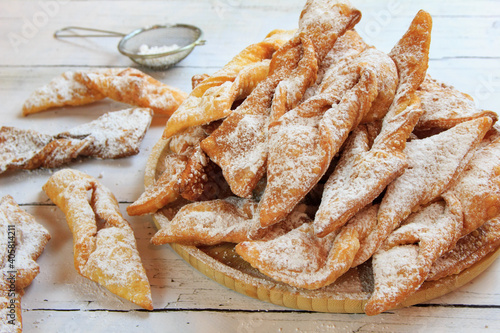 Faworki (angel wings) sprinkled with powdered sugar - traditional Polish carnival delicacy 
