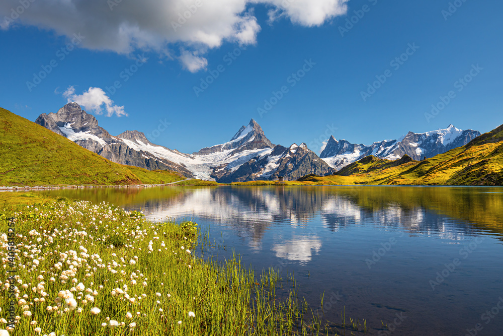 Sunrise  view on Bernese range above Bachalpsee lake. Popular tourist attraction. Location place Swiss alps, Grindelwald valley, Europe. 