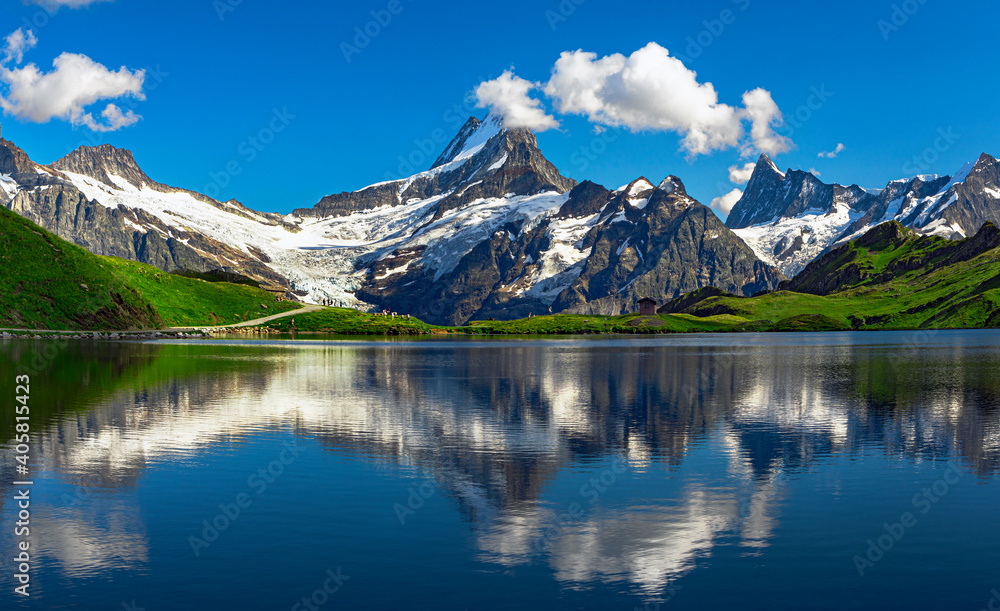 Sunrise view on Bernese range above Bachalpsee lake. Popular tourist attraction. Location place Swiss alps, Grindelwald valley, Europe.