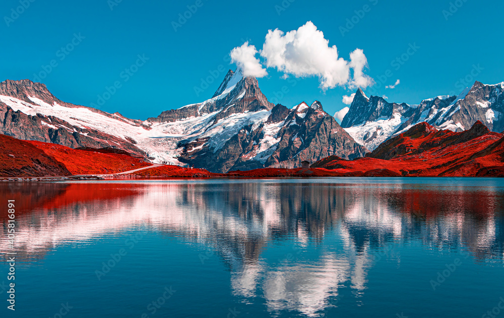 Sunrise view on Bernese range above Bachalpsee lake. Popular tourist attraction. Location place Swiss alps, Grindelwald valley, Europe.