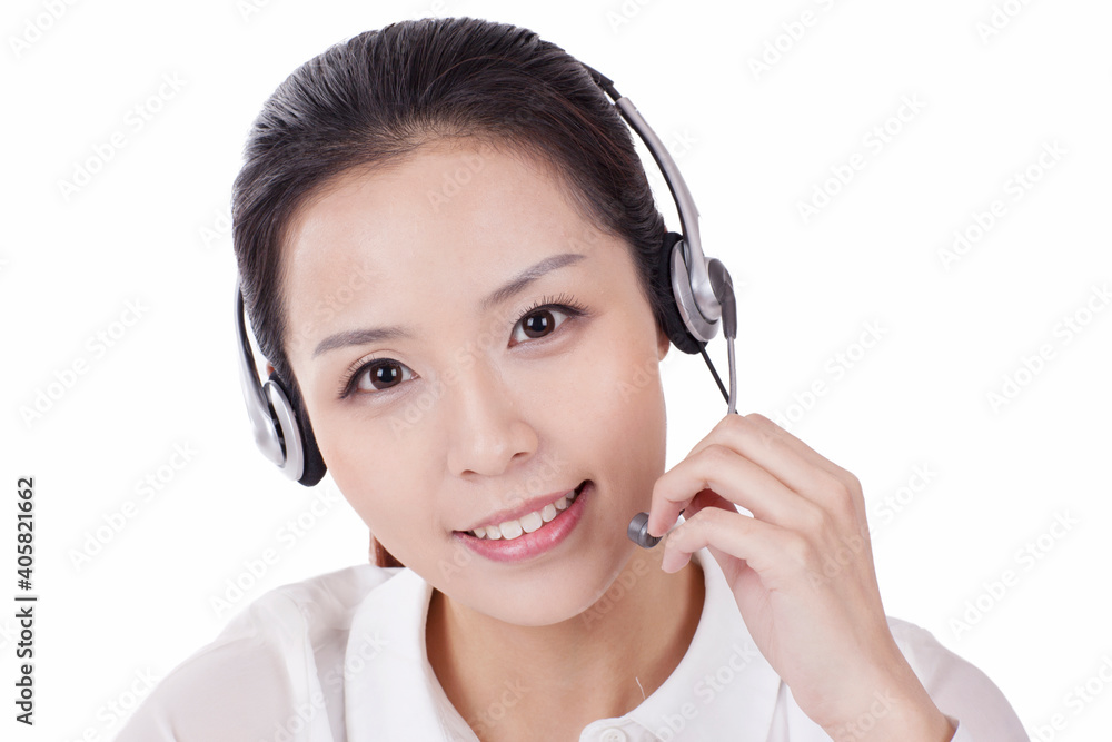 Female office worker wearing headset close-up portrait Female office worker wearing headset close-up portrait