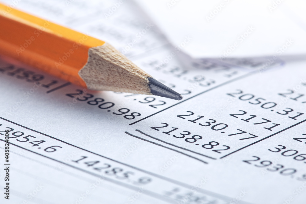 Accounting document with pencil and checking financial chart. Concept of banking, financial report and financial audit. Accounting document with pencil and checking financial chart. Concept of banking, financial report and financial audit.