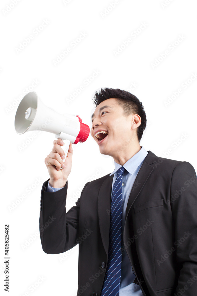 Portrait of young businessman shouting into Megaphone,close-up Portrait of young businessman shouting into Megaphone,close-up