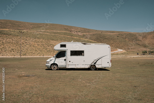House on wheels. RV - recreational vehicle trailer on camping in the mountains