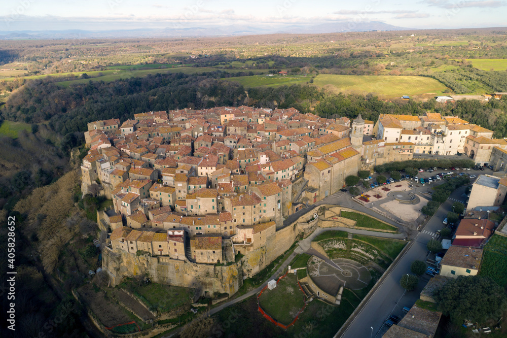 Aerial view of Farnese, A village in Viterbo, houses, roads and a landscape
