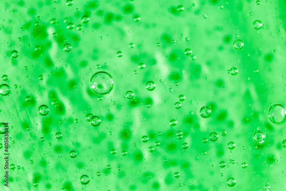 Liquid cream gel, green blue cosmetic texture with bubbles
