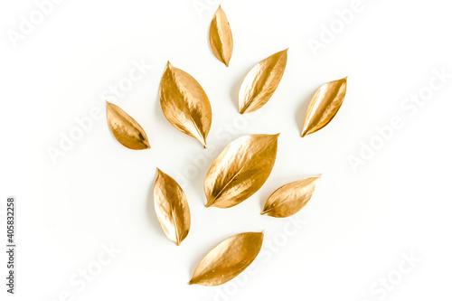 Pattern, texture with gold leaves isolated on white background. flat lay, top view
