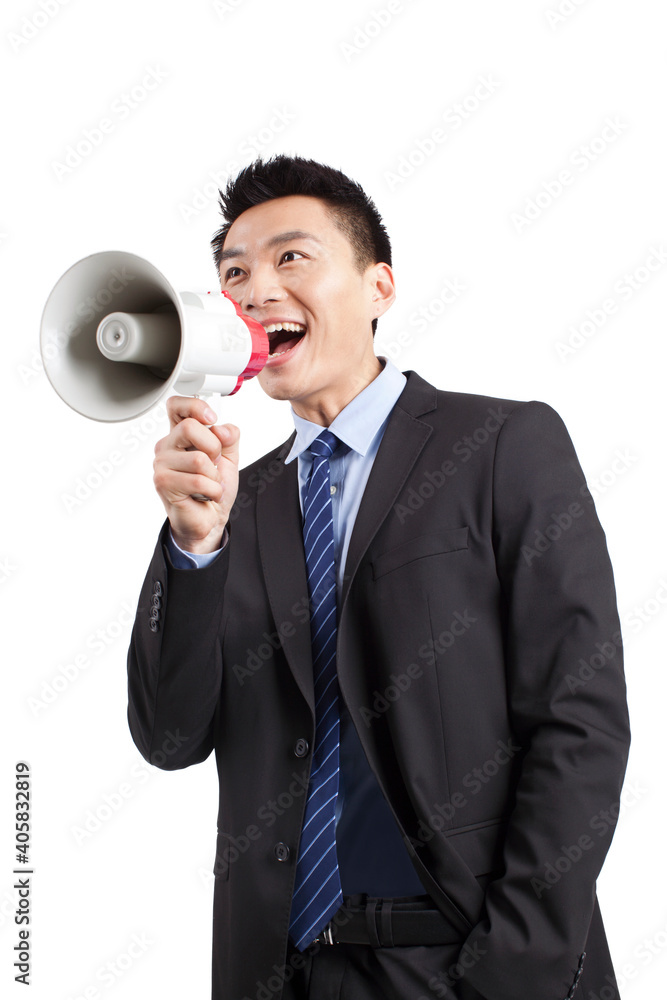 Portrait of young businessman shouting into Megaphone,close-up Portrait of young businessman shouting into Megaphone,close-up